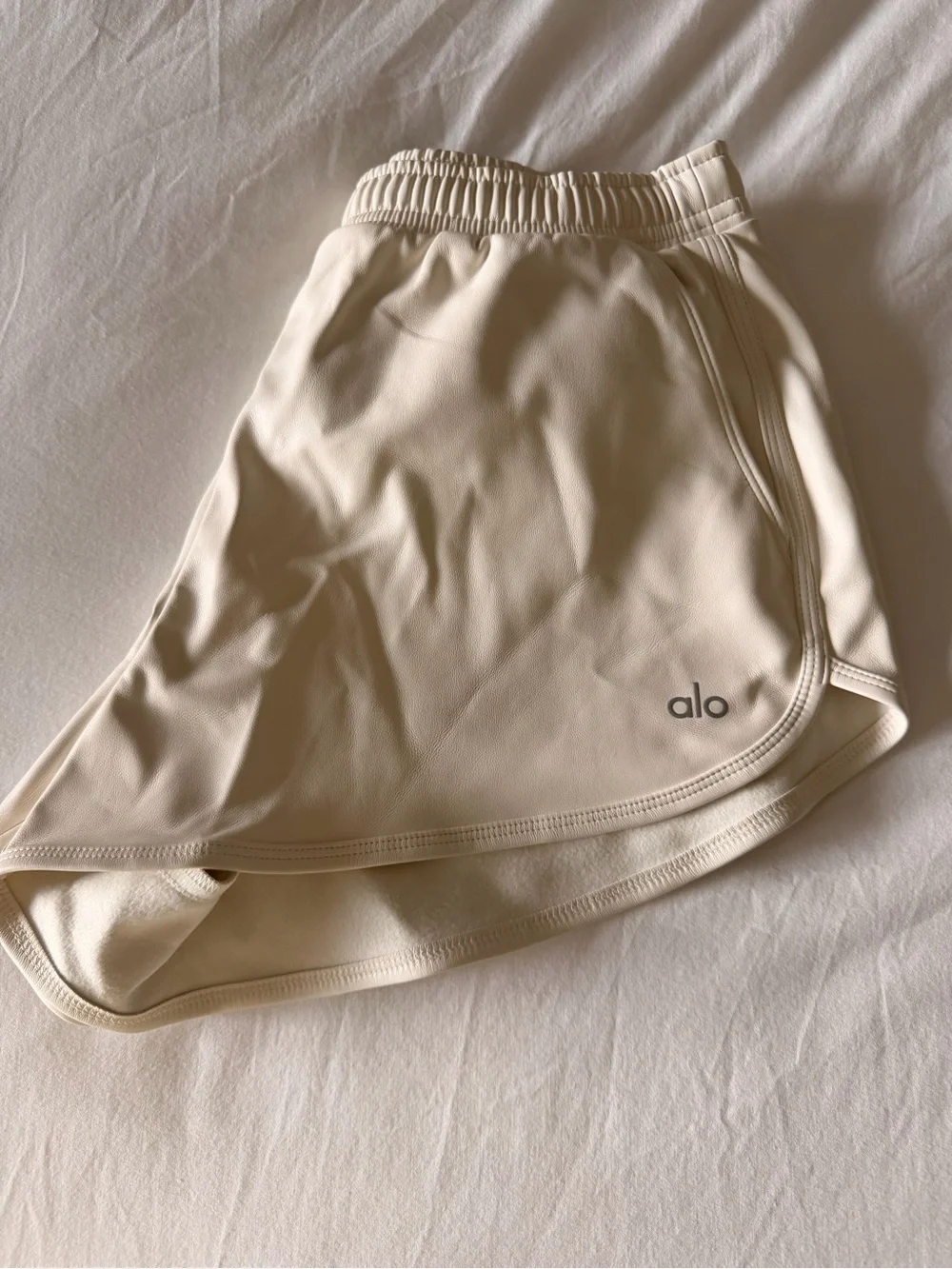 ALO Yoga Cream Faux Leather Shorts